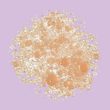 Assemble K - Play .Try .Glow holds a bottle of VELYVELY Collagen Sun Serum, a lightweight, hydrating SPF 50+ PA++++ sunscreen with a pinkish tint.