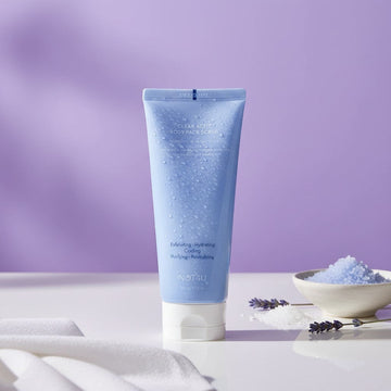 Assemble K - Play .Try .Glow NOT4U Clear Acfit Body Pack Scrub 220g, a blue tube of premium pure sea salt scrub for exfoliating, hydrating, cooling, and revitalizing skin.