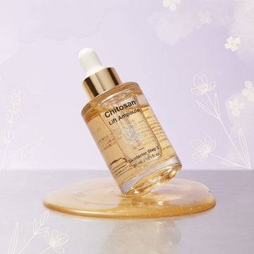 Assemble K - Play .Try .Glow Chitosan Lift Ampoule serum in a glass bottle with a dropper, golden liquid, for firming and lifting skin.