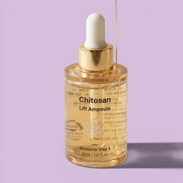 Assemble K - Play .Try .Glow Skinterior Step 3 Chitosan Lift Ampoule, a clear golden serum in a glass dropper bottle with gold accents.