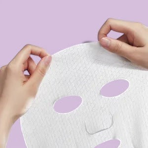 Assemble K Della Born Lotus Peel Mask, a sheet mask for soft peel, soothing, calming, and lightening. Contains 7 sheets.