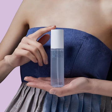 Assemble K - Play .Try .Glow: Della Born Seaweed Boosting Ampoule Mist 95ml bottle and box with Korean traditional roof pattern.