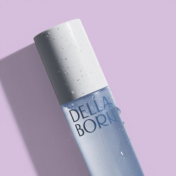 Assemble K - Play .Try .Glow: Della Born Seaweed Boosting Ampoule Mist 95ml bottle and box with Korean traditional roof pattern.