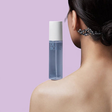 Assemble K - Play .Try .Glow: Della Born Seaweed Boosting Ampoule Mist 95ml bottle and box with Korean traditional roof pattern.