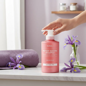 Assemble K - Play .Try .Glow KUNDAL Protein Bonding Shampoo in Leather Iris scent, 500ml bottle with pump dispenser. For damaged hair.