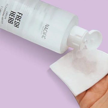 Assemble K - Play .Try .Glow: NACIFIC Fresh Herb Origin Cleansing Water with Bakuchiol, 300ml, clear bottle, plant-based retinol for slow-aging care.
