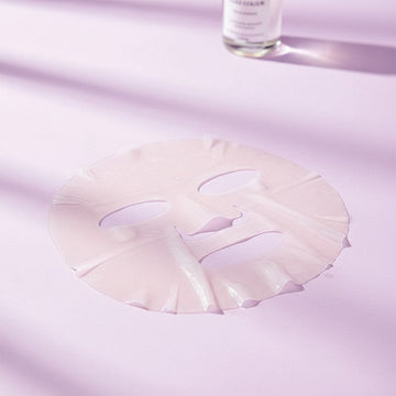 Assemble K - Play .Try .Glow Niacinamide Brightening Mask Pack on hand, clear serum, bamboo cellulose fabric