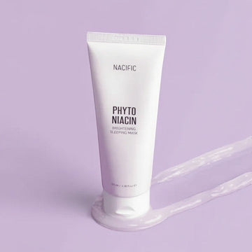 Assemble K - Play .Try .Glow NACIFIC Phyto Niacin Brightening Sleeping Mask tube with gel texture on a light blue background.