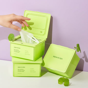 Assemble K - Play .Try .Glow Papa Recipe Real Centella Cica Daily Quick Cooling Mask packaging with tongs and centella leaves.