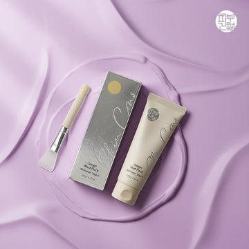 Assemble K - Play .Try .Glow Skinterior Step 0 Gongri Mud Pack in a tube with a spatula and box, set against a backdrop of loose mud.