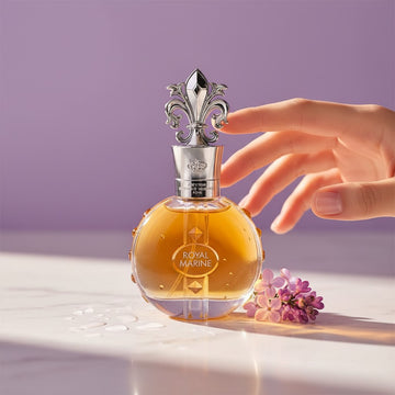 Assemble K - Play .Try .Glow Marina De Bourbon Royal Marina Diamond perfume bottle with a crown-shaped silver cap.