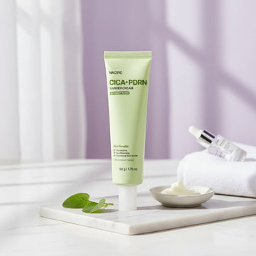 Assemble K - Play .Try .Glow NACIFIC Cica PDRN Barrier Cream tube with a swirl of cream. Soothes and strengthens skin.