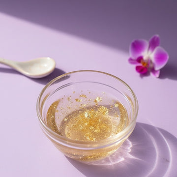 Assemble K - Play .Try .Glow Skinterior Step 3 ampoule with 24K gold flakes for intensive skin nourishment and wrinkle reduction.