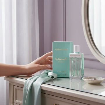 Assemble K - Play .Try .Glow Women'Secret Intimate Daydream perfume bottle and box on a vanity table