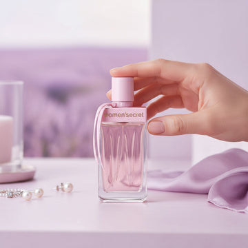 Assemble K - Play .Try .Glow Women'Secret Intimate Eau de Parfum 100ml in a clear glass bottle with a soft pink cap.