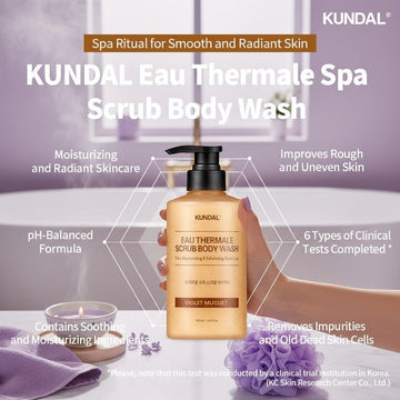 Assemble K Kundal Eau Thermale Spa Scrub Body Wash in a light orange bottle with a black pump, 500ml. For moisturizing, radiant, and smooth skin.