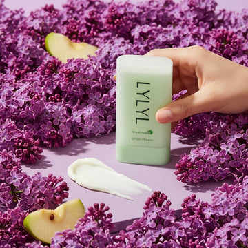 Assemble K - Play .Try .Glow LYLYL Green Apple No-Sebum Sunstick SPF50+ PA++++ with a swatch of sunscreen.
