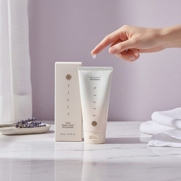 Assemble K - Play .Try .Glow Tiela Ritual Low pH Gel Cleanser tube and box with a drop of cleanser falling from a finger.