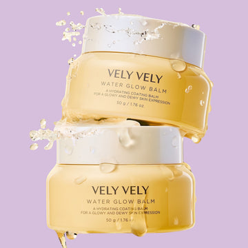 Assemble K - Play .Try .Glow VELY VELY Water Glow Balm 50g jar and box with a yellow flower on a pink arch.