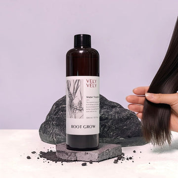 Assemble K - Play .Try .Glow VELY VELY Root Grow Water Treatment bottle with black cap, dark brown glass, and white label featuring root illustration.