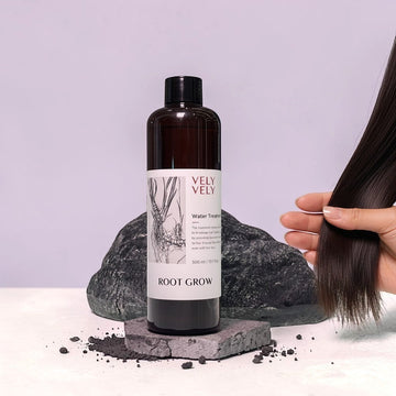 Assemble K - Play .Try .Glow VELY VELY Root Grow Water Treatment bottle with black cap, dark brown glass, and white label featuring root illustration.