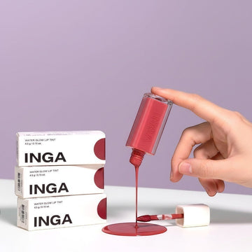 Assemble K - Play .Try .Glow INGA Water Glow Lip Tint in a dusty rose shade, with applicator wand shown.