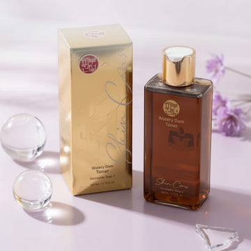 Assemble K - Play .Try .Glow Skinterior Step 2 Watery Dam Toner in amber glass bottle with gold cap. Hydrating, rebalancing toner for clearer skin.