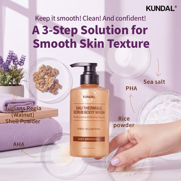 Assemble K - Play .Try .Glow Kundal Eau Thermale Scrub Body Wash in Cozy Darjeeling scent, featuring walnut shell powder, AHA, PHA, sea salt, and rice powder for smooth, radiant skin.