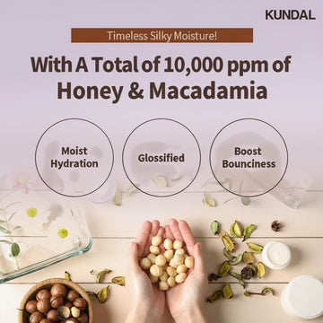 KUNDAL Baby Powder Honey & Macadamia Shampoo 500ml, featuring moist hydration, glossified, and boost bounciness.