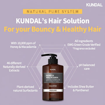 KUNDAL Honey & Macadamia Baby Powder Shampoo 500ml, a brown bottle with a pump dispenser, featuring natural ingredients and pH balanced care.