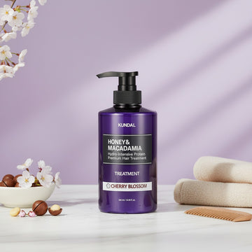 KUNDAL Honey & Macadamia Hydro-Intensive Protein Premium Hair Treatment in Cherry Blossom scent, 500ml bottle.